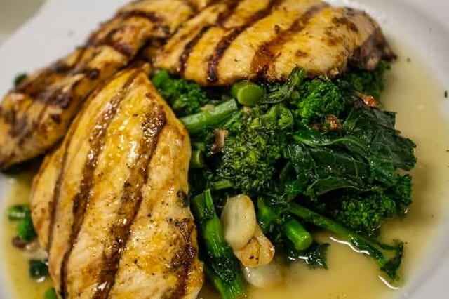 Grilled Chicken over Broccoli Rabe Catering.
